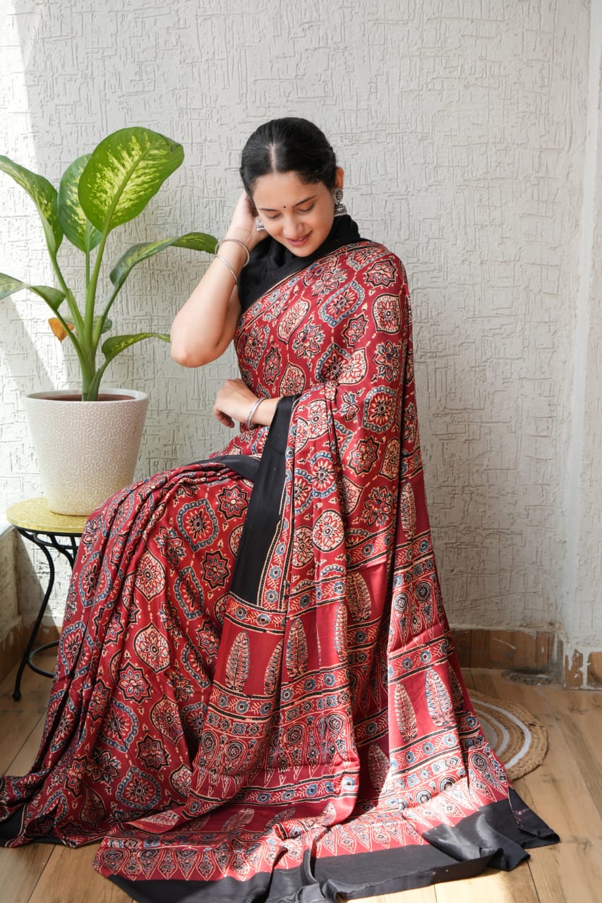 Handblock printed Ajrakh saree in traditional star pattern