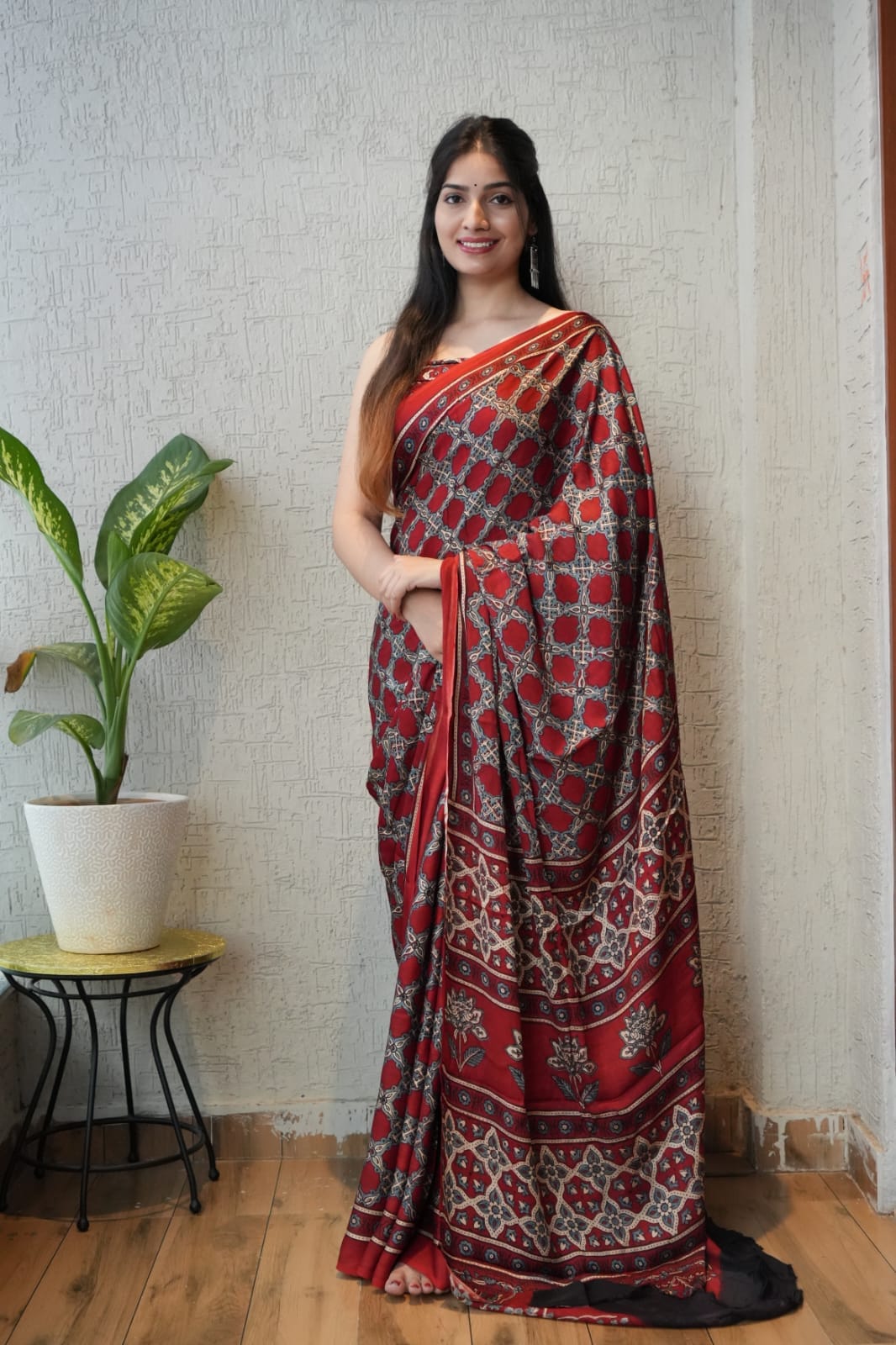 Handblock printed Ajrakh saree in bold black and red checks