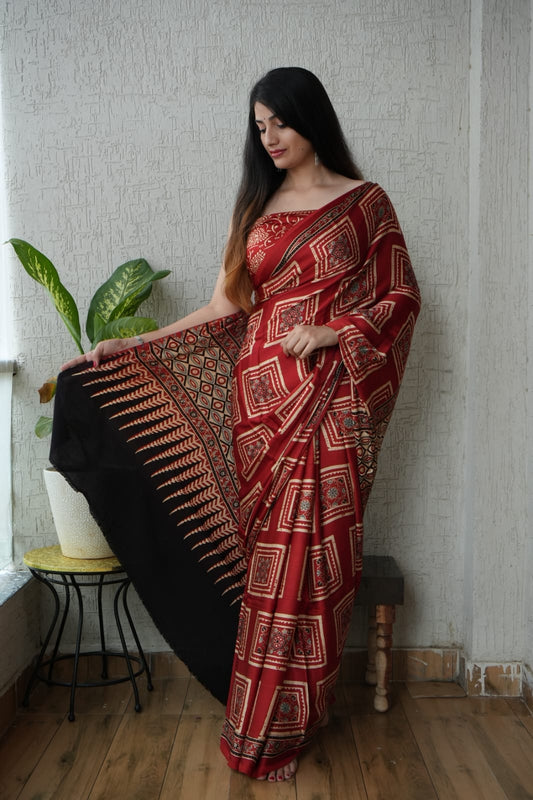 Handblock printed Ajrakh saree in madder red and charcoal contrast